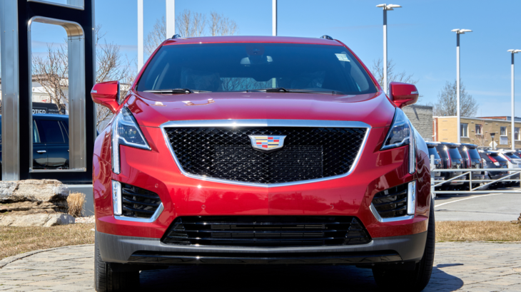 A Red Cadillac XT5 parked in a lot